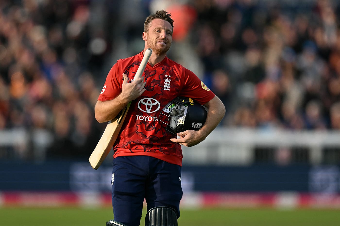 Jos Buttler 96, Liam Dawson four-for seal spoils for England