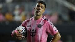 Suarez appears to spit at opposition coach after melee Suarez appears to spit at opposition coach after melee