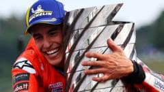 Marquez wins seventh MotoGP title to equal Rossi